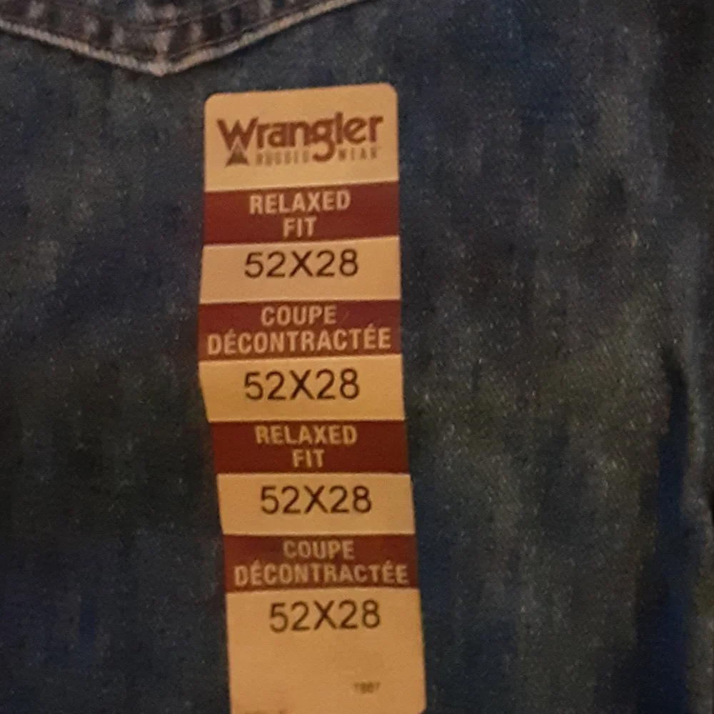 Wrangler Rugged Wear relaxed fit classic jean 5 pocket style NEW 52X28 MSRP $35…